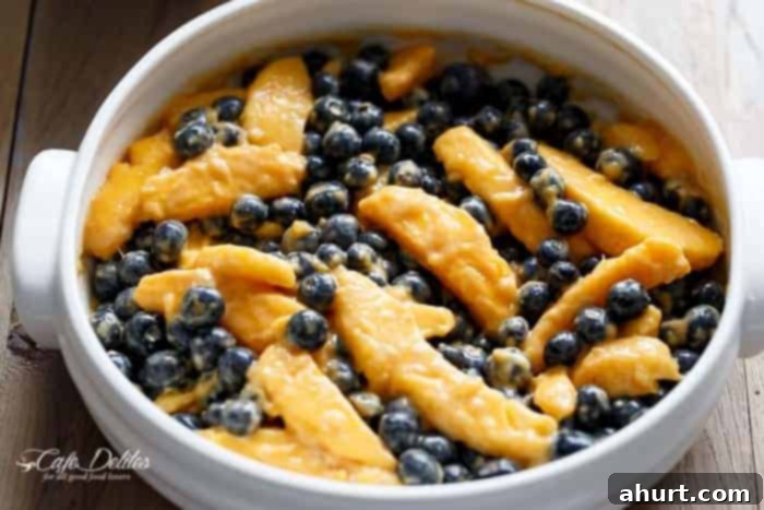 Raw pieces of Easy Mango Blueberry Crumble 