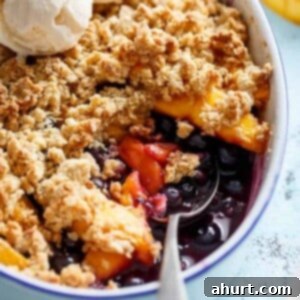 Sunshine Mango Blueberry Crumble 7 Mango Blueberry Crumble in a bowl