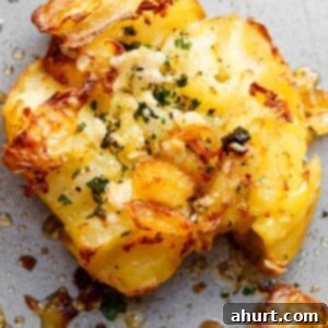 Ultimate Crispy Garlic Butter Parmesan Smashed Potatoes 7 Crispy Garlic Butter Parmesan Smashed Potatoes with irresistibly crispy edges.