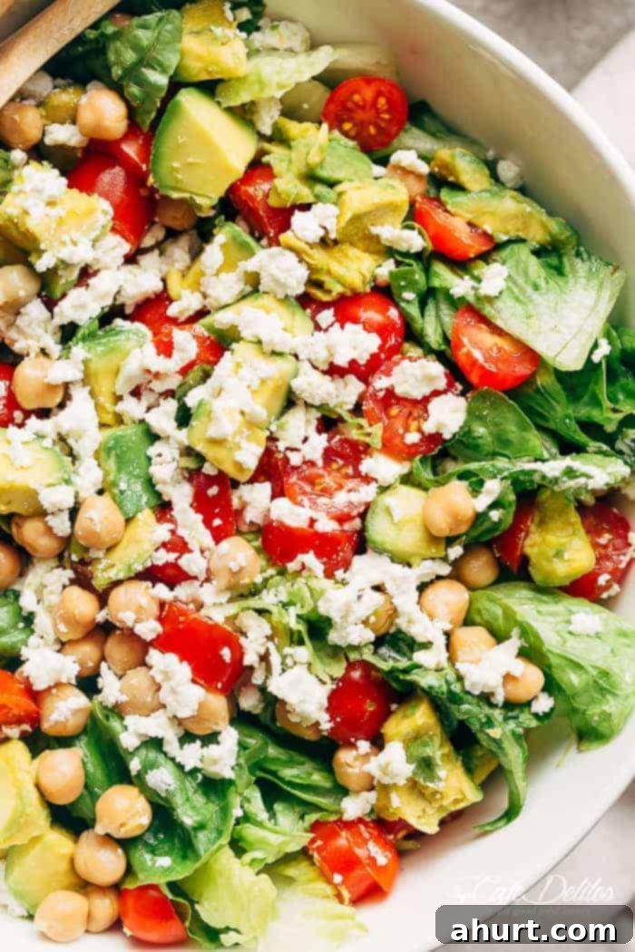 Vibrant Balsamic Chickpea Avocado Feta Salad 8 Top-down view of the finished Balsamic Chickpea Avocado Feta Salad, garnished and ready to be served.