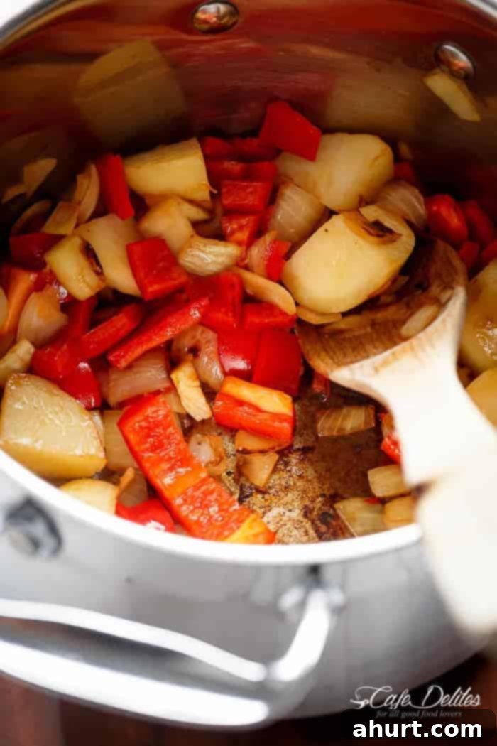 Velvety Roasted Tomato Basil Soup 5 Raw ingredients for Creamy Roasted Tomato Basil Soup in a bowl