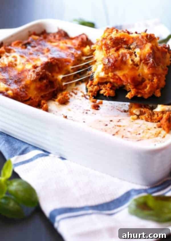 Harvest Chicken Pumpkin Ricotta Lasagna 6 Individual pieces of Chicken Pumpkin and Ricotta Lasagna arranged in a tray, ready to be served.
