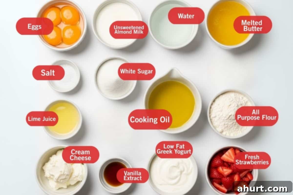 Flat lay photo of ingredient shot of eggs, unsweetened almond milk, water, melted butter, salt, white sugar, cooking oil, all purpose flour, lime juice, cream cheese, vanilla extract, low fat greek yogurt, fresh strawberries