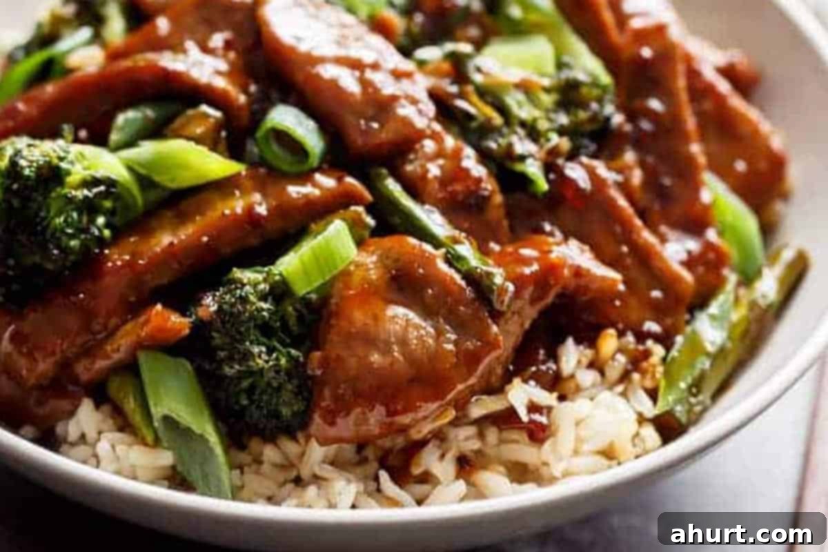 Extra Saucy Mongolian Beef and Broccoli 11 Close-up shot of Mongolian Beef and Broccoli.