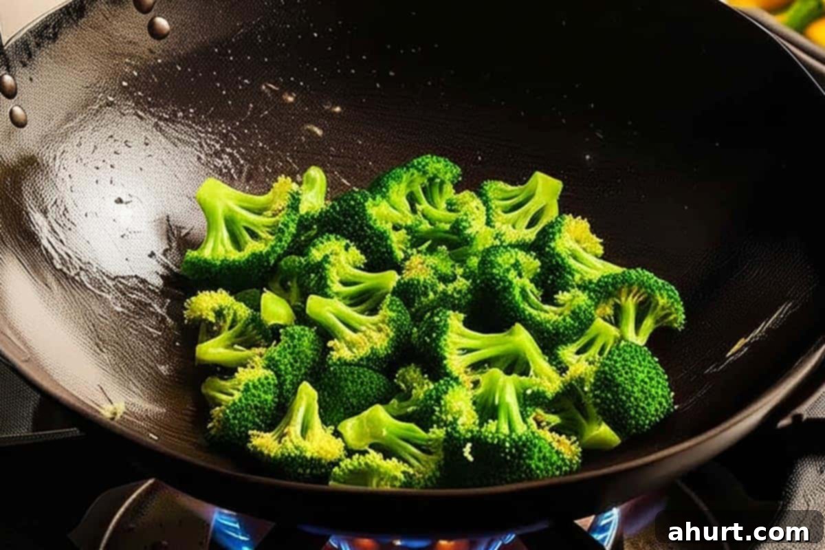 Extra Saucy Mongolian Beef and Broccoli 8 Added the broccoli florets to the wok.