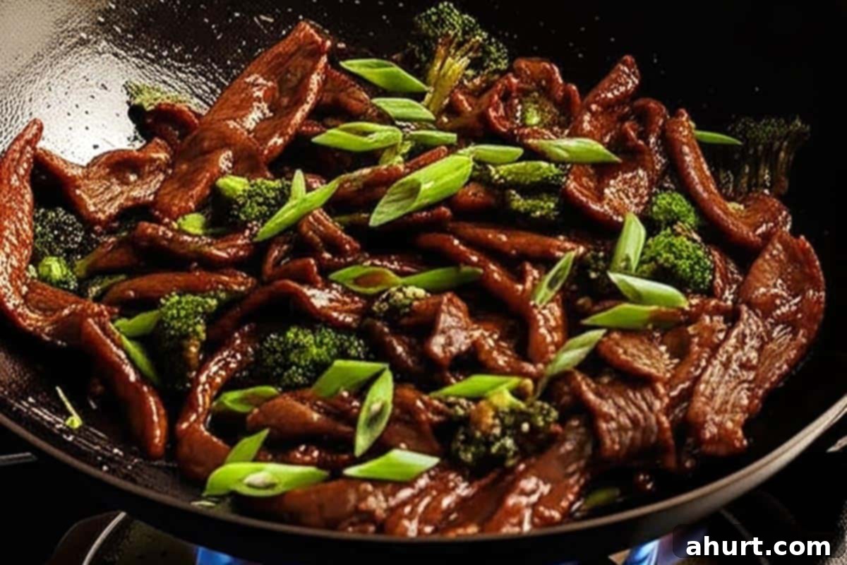Extra Saucy Mongolian Beef and Broccoli 10 Stirred in the cornstarch slurry and added the sliced green onions.
