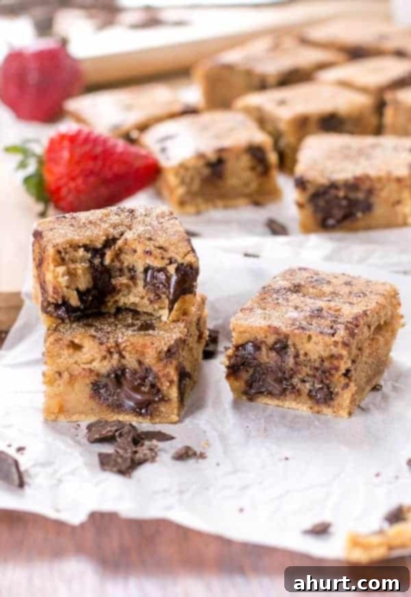 Cinnamon Sugar Chocolate Chunk Blondies 3 Churro Blondies being stack on each other