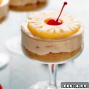 No-Bake Tropical Pineapple Cheesecakes 6 No Bake Pineapple Cheesecakes in a glass