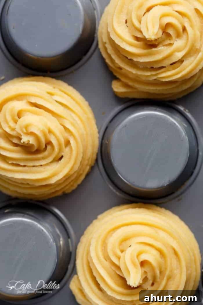 Churro Bowl Cups in the making on an upside-down muffin tin