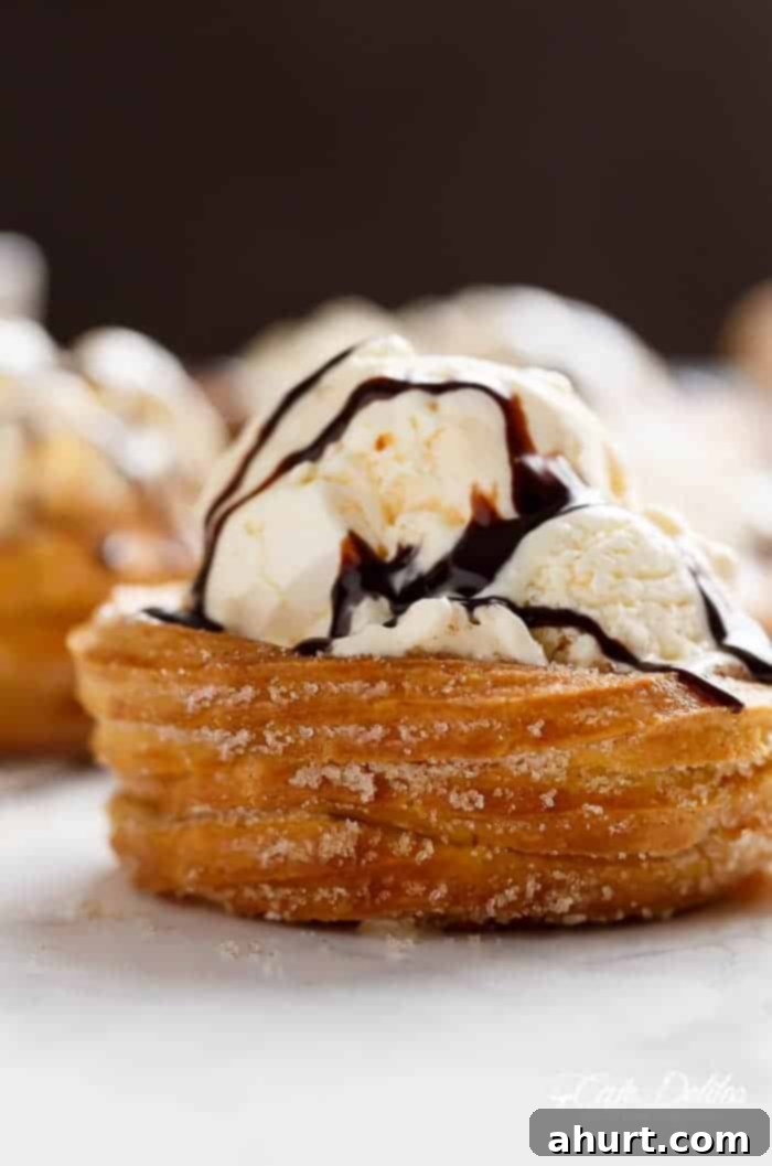 Large Churro Ice Cream Bowls (Cups) with a generous scoop of an ice cream, ready to be enjoyed