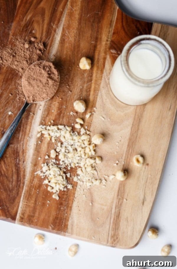 Decadent Nutella Brownie Oatmeal 4 Raw ingredients on wooden plank