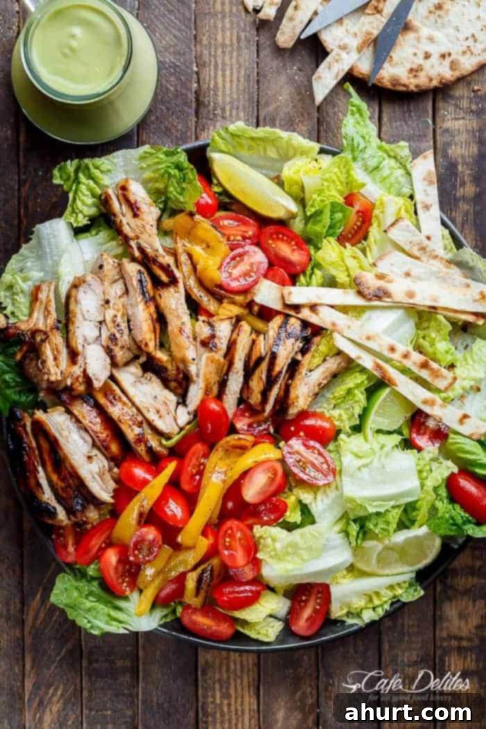 Tequila Lime Grilled Chicken Taco Bowl 2 Tequila Lime Chicken Taco Salad with an Avocado Crema spiked with honey, lime and booze. Complete with tortilla strips, have a chicken taco in a salad!