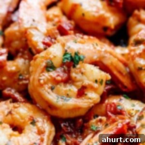 Zesty Sun-Dried Tomato Garlic Shrimp 9 Spicy Garlic Sun Dried Tomato Shrimp in a bowl, a square image for the recipe card.