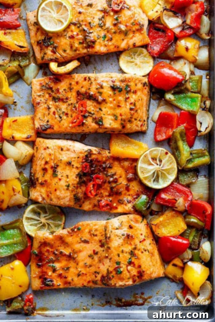 Effortless Chili Lime Salmon Bake 2 Sheet Pan Chili Lime Salmon with Fajita flavours, and a charred, crispy roasted trio of peppers
