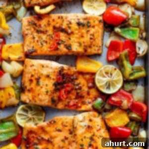 Effortless Chili Lime Salmon Bake 4 Sheet Pan Chili Lime Salmon pieces on a baking tray
