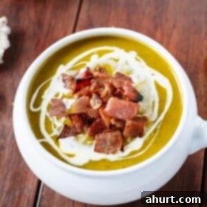 Golden Pumpkin Velouté with Spinach Ribbons and Crispy Bacon Crumble 10 Creamy Pumpkin and Spinach Soup with Crispy Bacon in a bowl