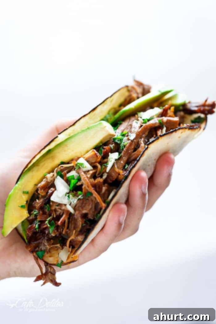 Fall-Apart Tender Slow Cooker Barbacoa Short Rib Tacos 4 Slow Cooker Barbacoa Short Ribs full of barbacoa flavours! Meat so tender it falls off the bone before being stuffed into Taco's and served with Avocado!