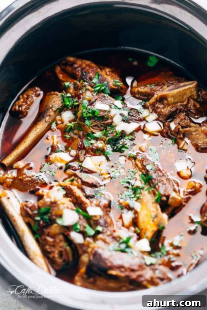 Fall-Apart Tender Slow Cooker Barbacoa Short Rib Tacos 5 Cooking image of Mexican Short Rib Tacos