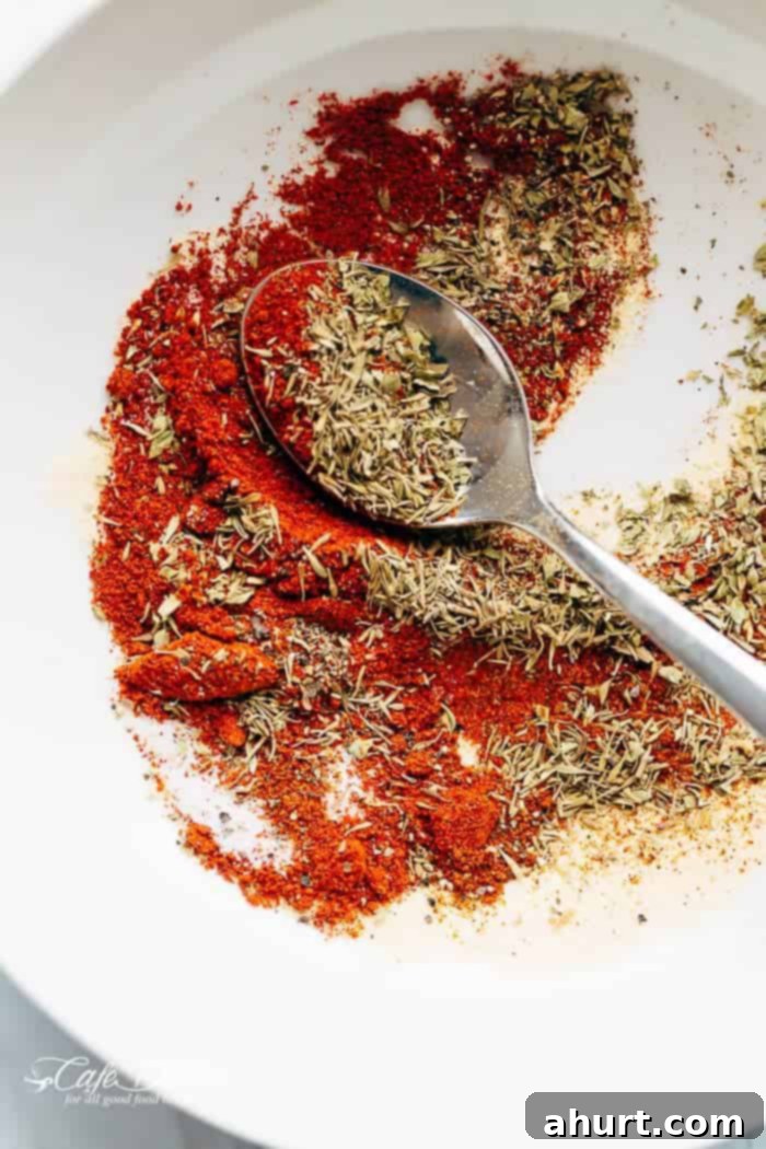 Vibrant Grilled Cajun Chicken Salad with fresh vegetables and creamy dressing served in a large bowl