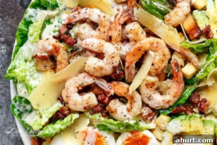 Top view image of Skinny Lemon Garlic Shrimp Caesar Salad with all components