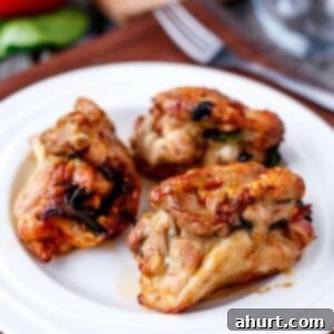 Feta Bacon Sundried Tomato Chicken Roulades 10 Feta, Bacon and Sundried Tomato Stuffed Chicken Rolls on a plate