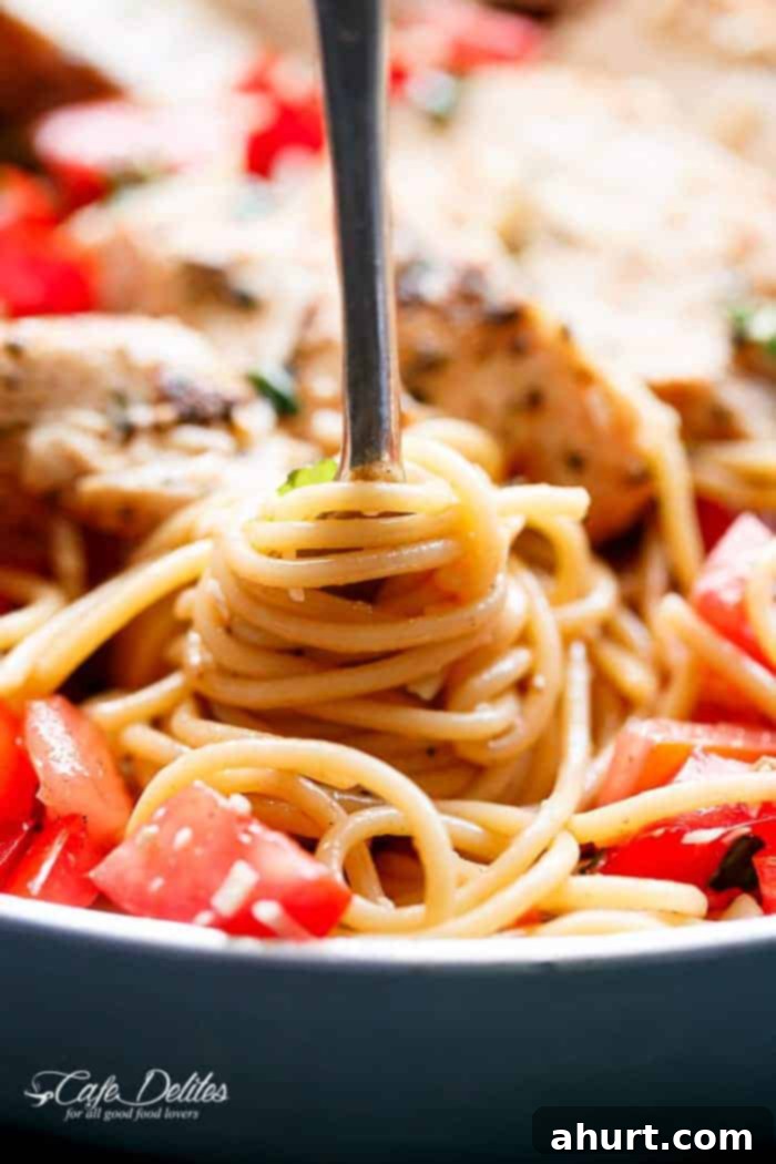 Summer Bruschetta Chicken Pasta Salad 3 Bruschetta Chicken Pasta Salad is Filled with Italian seasoned grilled chicken, garlic and parmesan cheese!