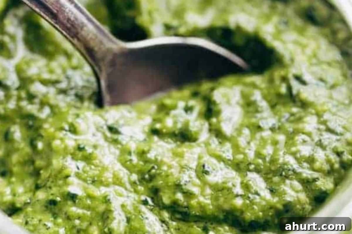 Freshly Made Basil Pesto Perfection 7 Add a pinch of salt to the freshly made pesto and pulse again to combine, ensuring all flavors are perfectly balanced. Adjust seasoning as needed.