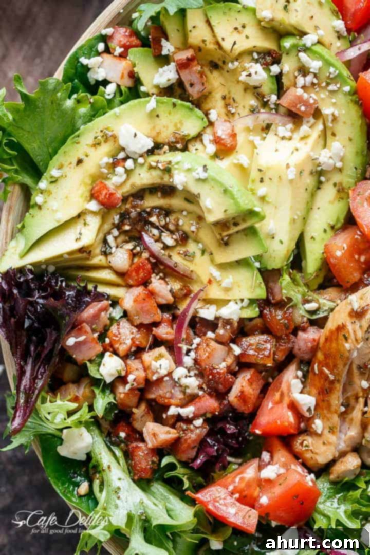 BLT Salad with Balsamic Chicken, Avocado & Feta 5 Close-up shot of BLT Balsamic Chicken Avocado Feta Salad, highlighting bacon and feta toppings