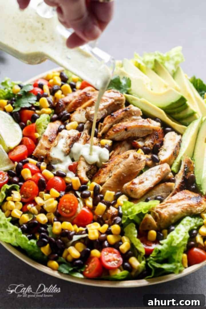 Fiery Fiesta Chicken Salad 12 A Low Fat Creamy Dressing pouring over Southwestern Chicken Salad