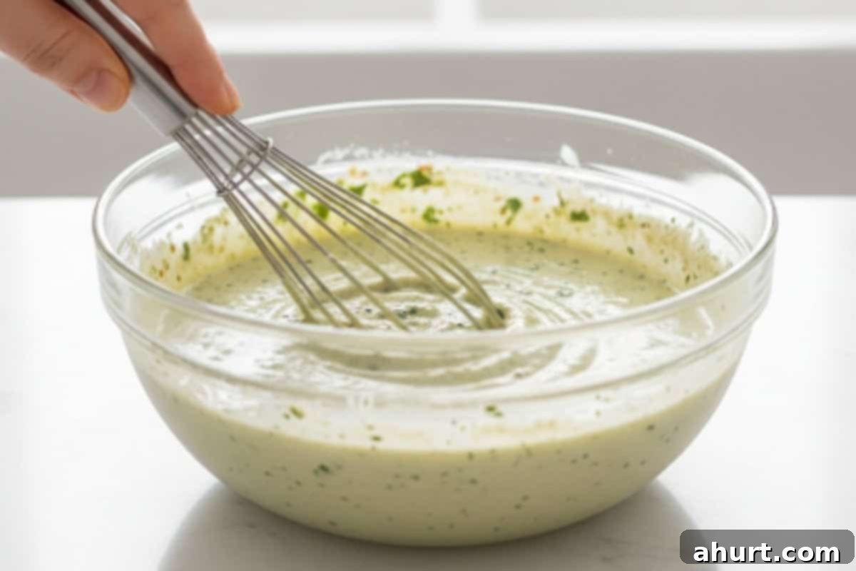 Fiery Fiesta Chicken Salad 9 Take the reserved marinade and stir in the Greek yogurt and whisk.