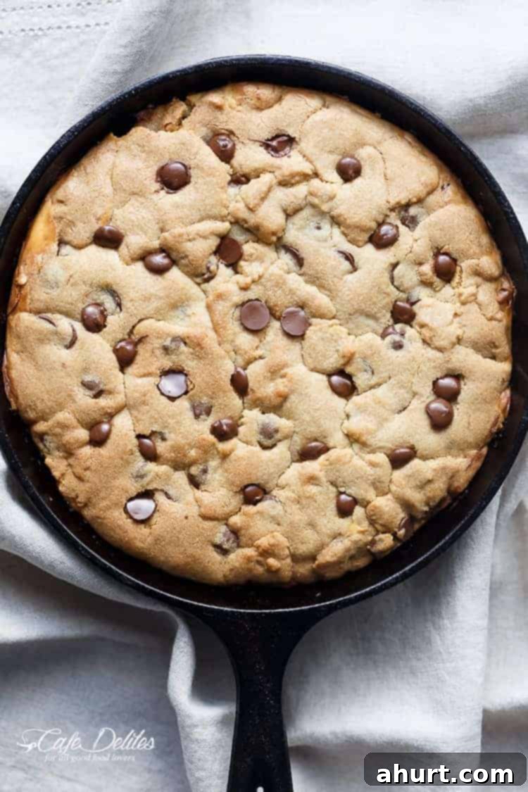 Cheesecake Stuffed Pizookie 5 Top view image of Cheesecake Stuffed Chocolate Chip Skillet Cookie