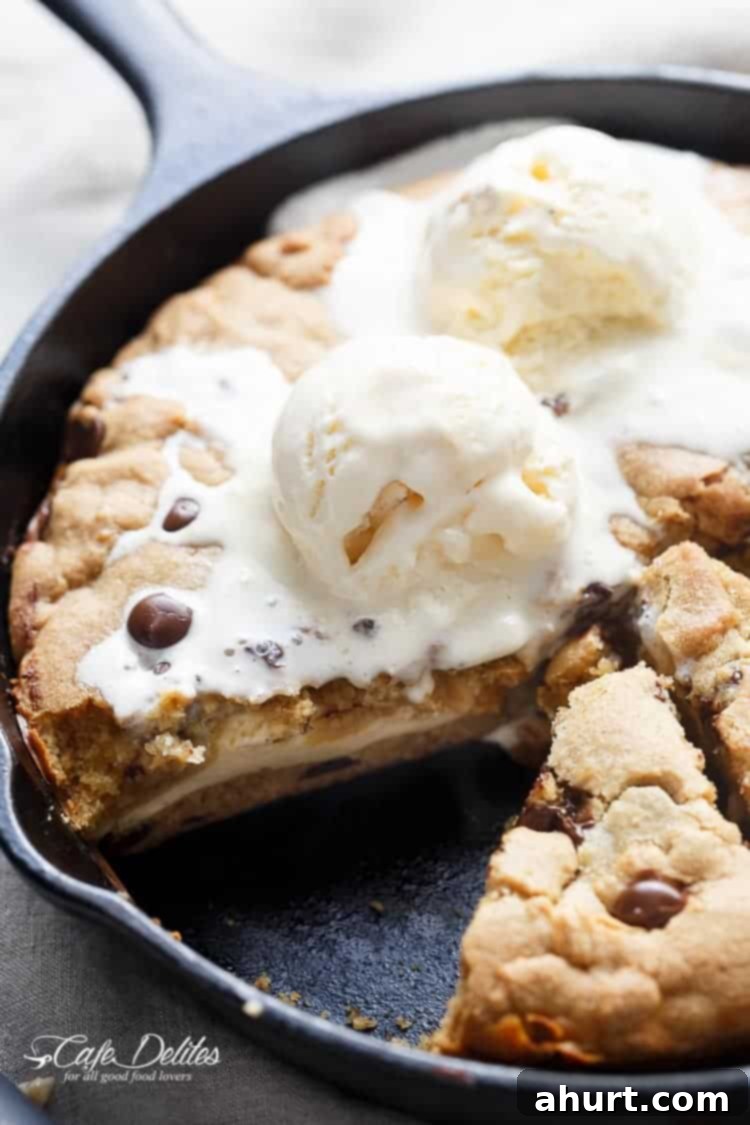 Cheesecake Stuffed Pizookie 6 Cheesecake Stuffed Skillet Cookie with ice cream scoop on top
