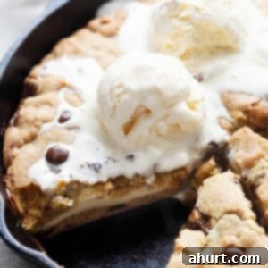 Cheesecake Stuffed Pizookie 8 Cheesecake Stuffed Skillet Cookie with ice cream scoop on top