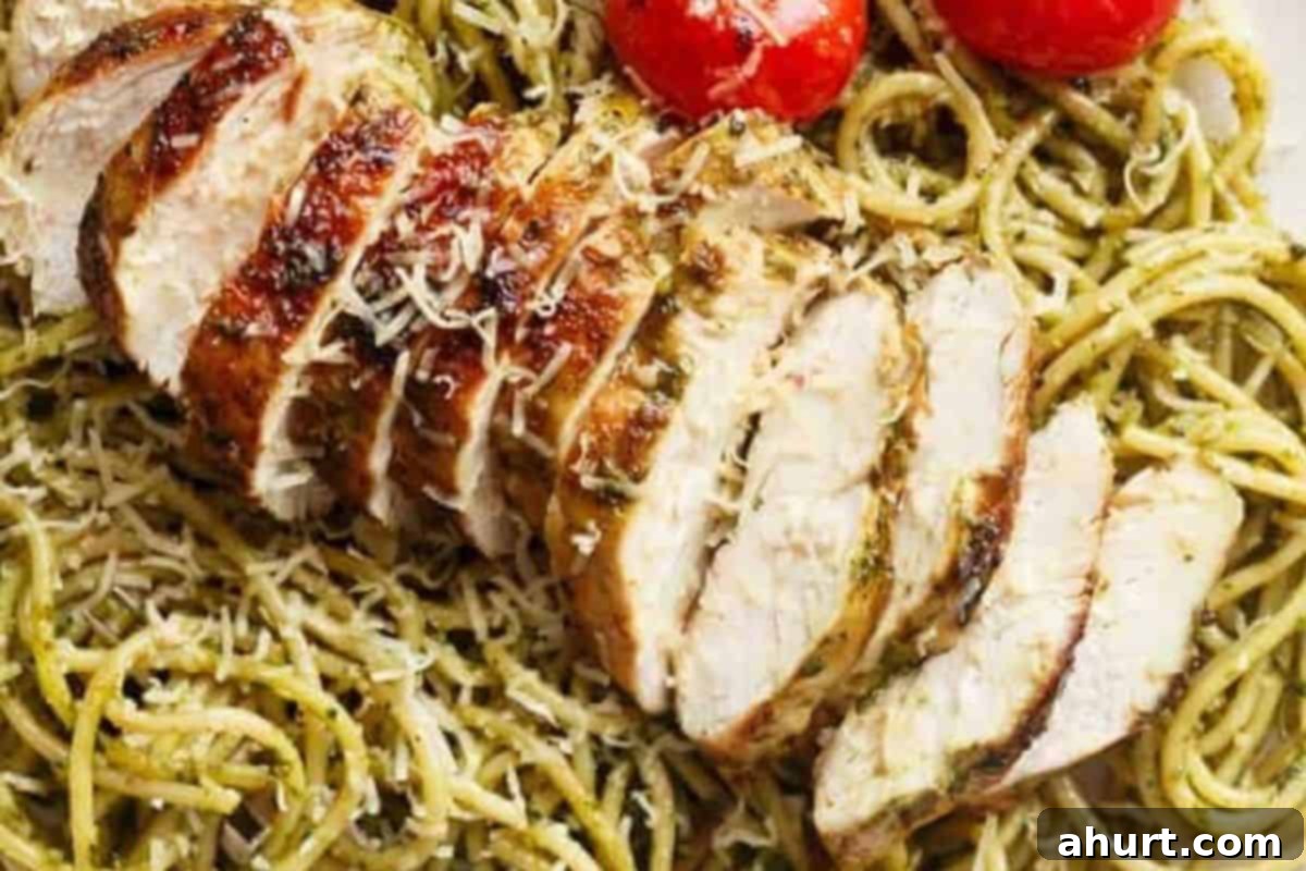 Vibrant Pesto Chicken Spaghetti 9 Slice the chicken and arrange over the pesto spaghetti and tomatoes. Add freshly grated parmesan on top to serve.