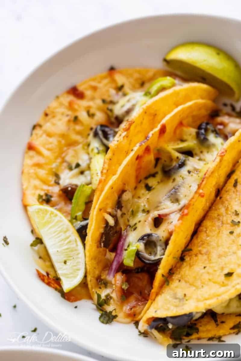 Smoky BBQ Chicken Taco Pizza 6 Easy Oven Baked Barbecue Chicken Pizza Tacos are full of pizza flavours, stuffed inside a crispy taco shell, to give you the BEST of both worlds