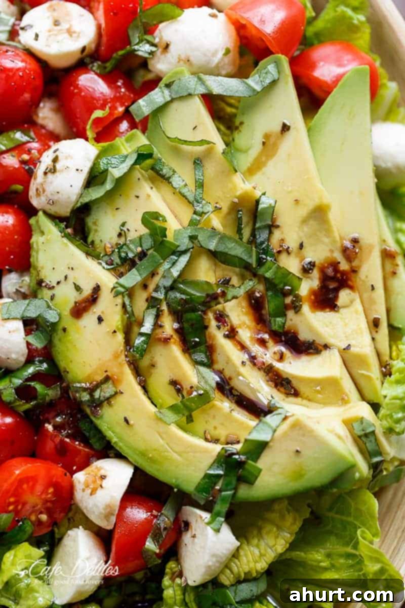 Detailed shot of creamy avocado slices adding richness to the salad