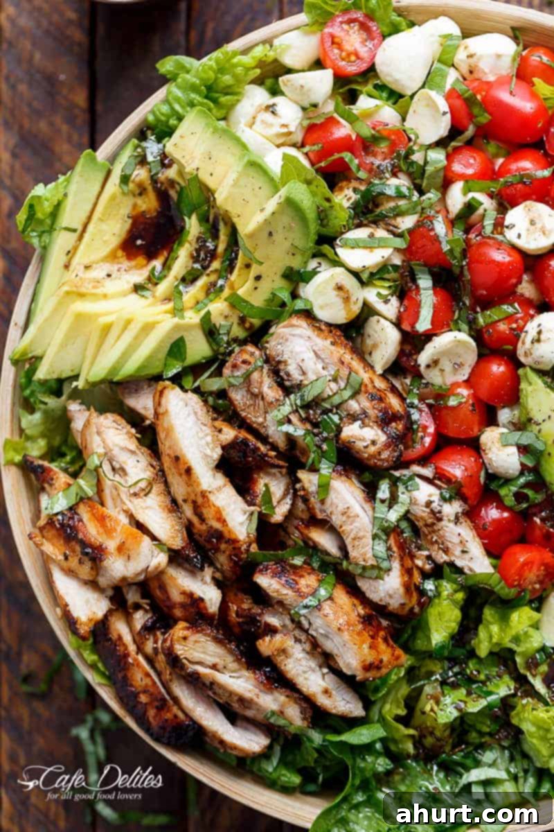 Top-down view of a vibrant and fresh Balsamic Chicken Avocado Caprese Salad