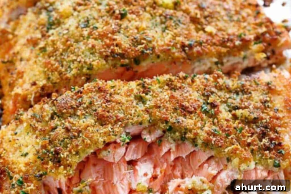 Crispy Parmesan Salmon 7 Baked Parmesan crusted salmon served with lemon wedges.