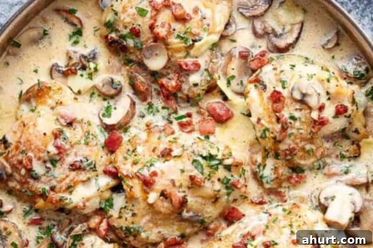Luscious Creamy Garlic Parmesan Chicken 11 Finished Creamy Garlic Parmesan Chicken topped with extra chopped parsley and shaved Parmesan.