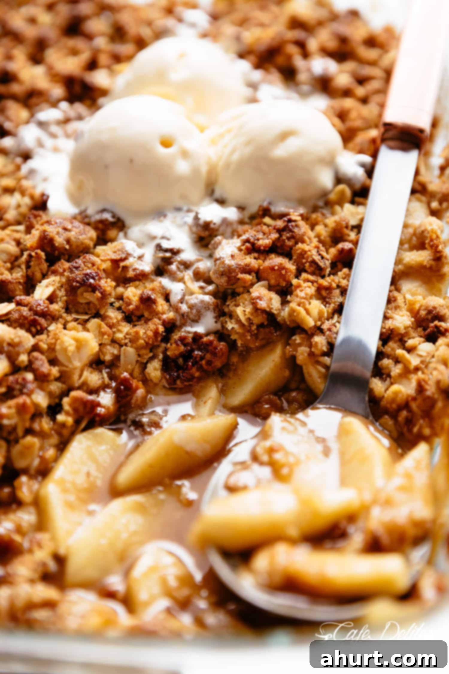 Effortless Apple Crumble 7 Apple Crumble: apple pie filling is covered with a crispy oatmeal cookie-like topping in a spoon