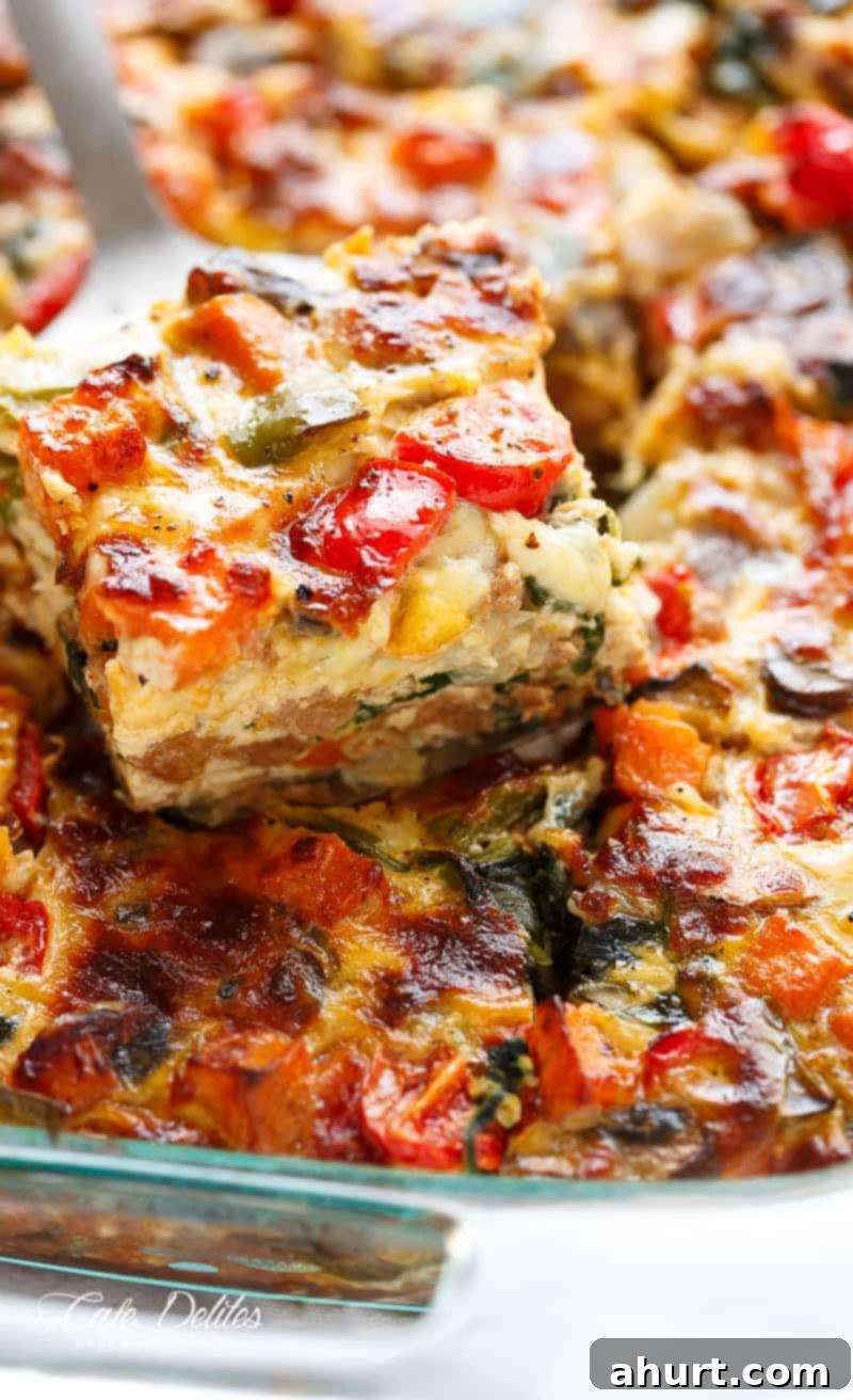 Sweet Potato Hash Brown Breakfast Bake 3 A piece removed from Sweet Potato Hash Brown Breakfast Casserole
