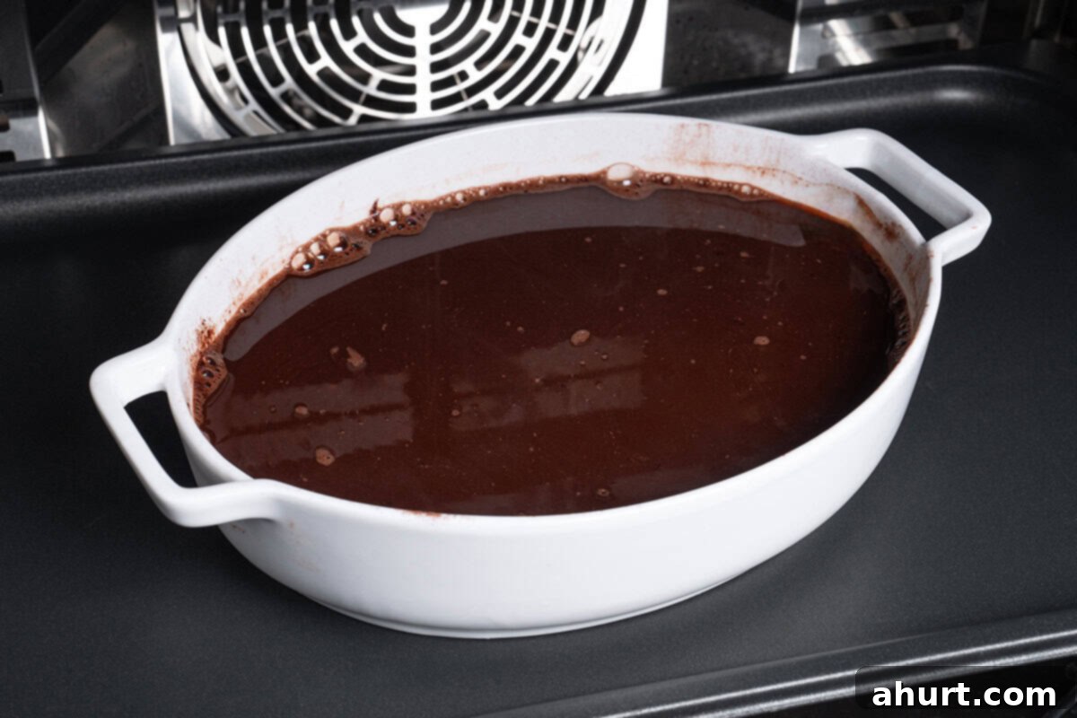 Molten Chocolate Fudge Pudding Cake 8 wet cocoa mix in oven