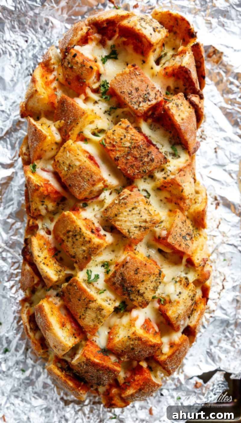 Garlic Butter Pizza Monkey Bread 3 Garlic Butter Pizza Pull Apart Bread on a foil