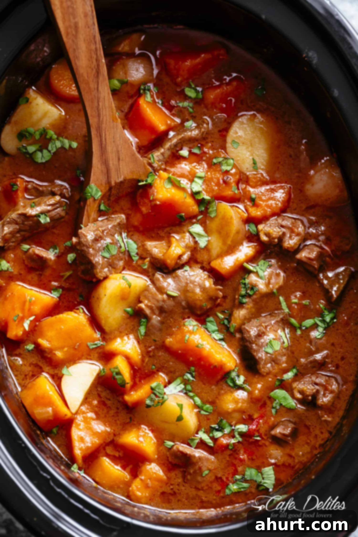 Hearty Slow Cooker Beef and Sweet Potato Stew 2 Slow Cooker Beef Stew filled with fall apart, tender beef pieces and sweet potato