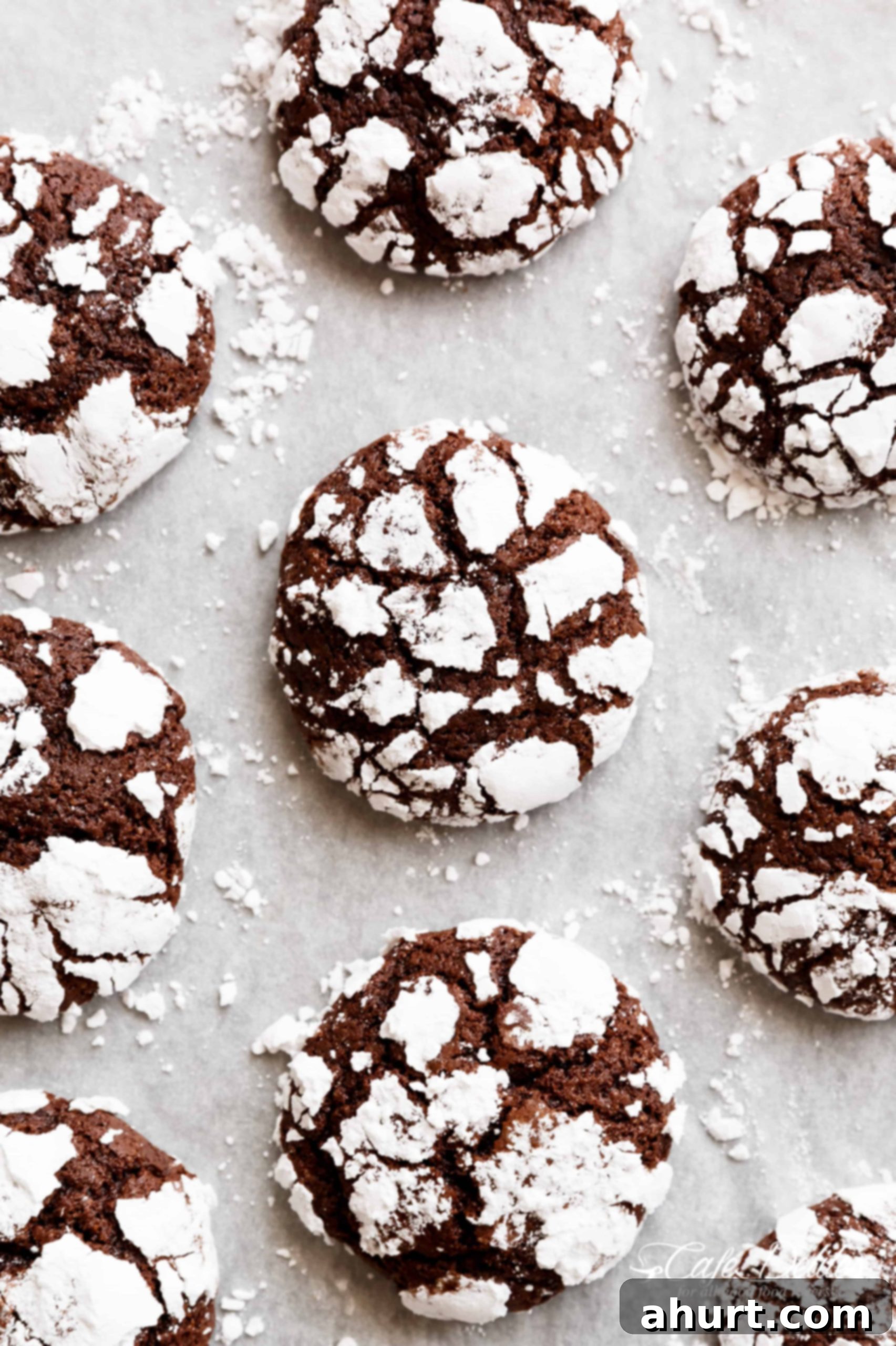 Fudgy Chocolate Crinkle Cookies have an irresistible brownie textured centre, with a crunch of cookie on the outside! One of our favourite Christmas cookies right here! ONLY 88 calories EACH!