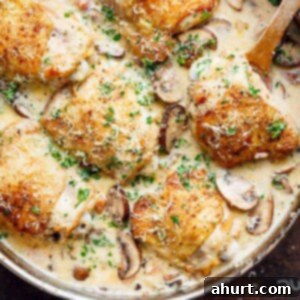 Creamy Parmesan Herb Mushroom Chicken Without the Cream 6 Creamy Parmesan Herb Mushroom Chicken in a pan, ready to be served