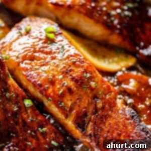Golden-Crisped Salmon with Zesty Honey-Orange Glaze 4 Crispy Honey Orange Glazed Salmon, ready to be served