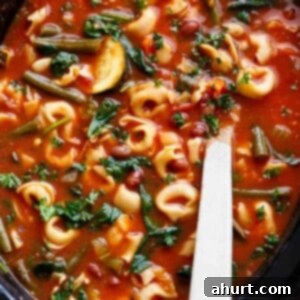 Comforting Crockpot Tortellini Minestrone 5 Slow Cooker Tortellini Minestrone Soup in a bowl