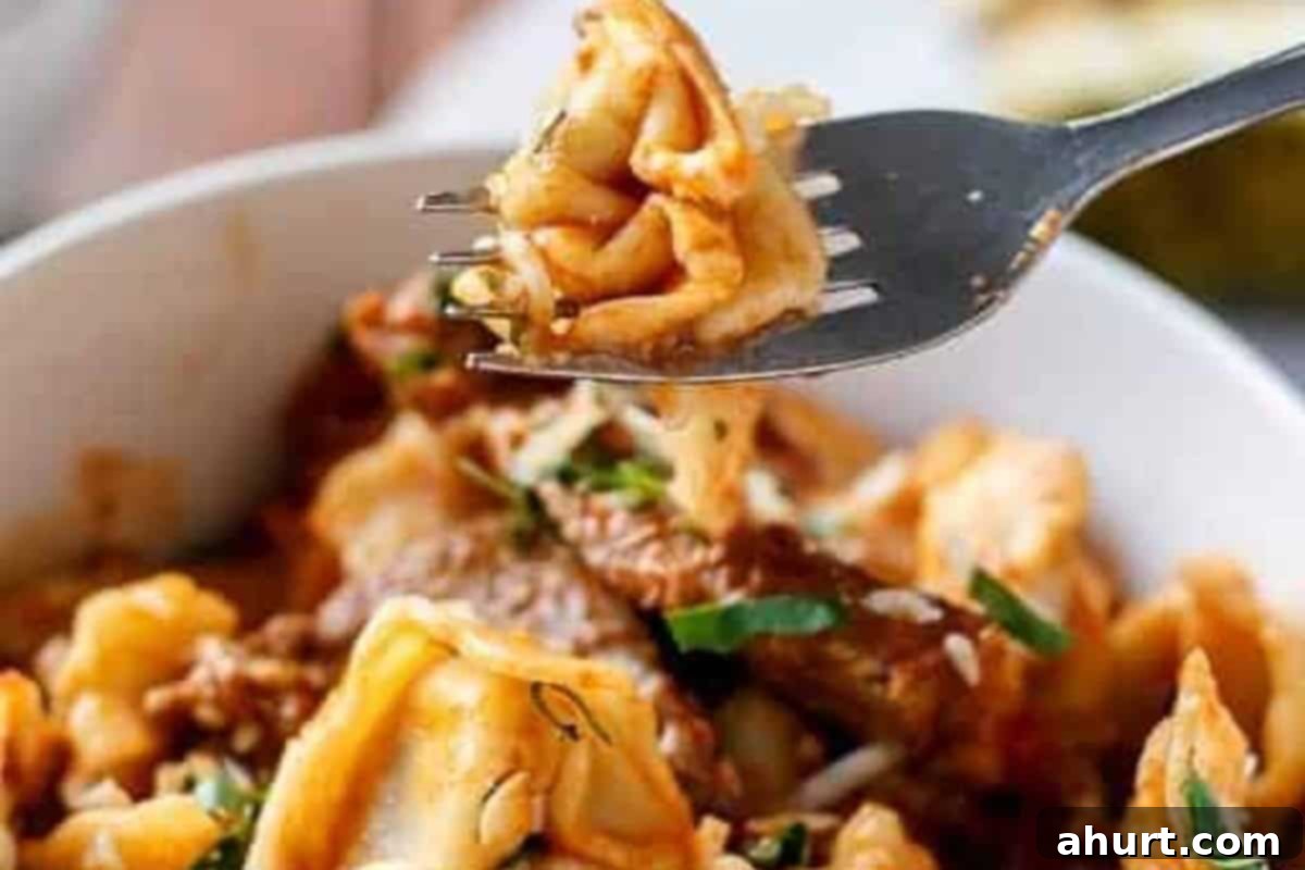 Hearty Beef Tortellini with Chunky Sauce 11 Transfer to bowls and sprinkle with parmesan and the remaining parsley