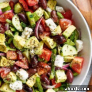 Perfect Greek Salad 9 Yum Avocado Greek Salad with a Greek Salad Dressing in a bowl